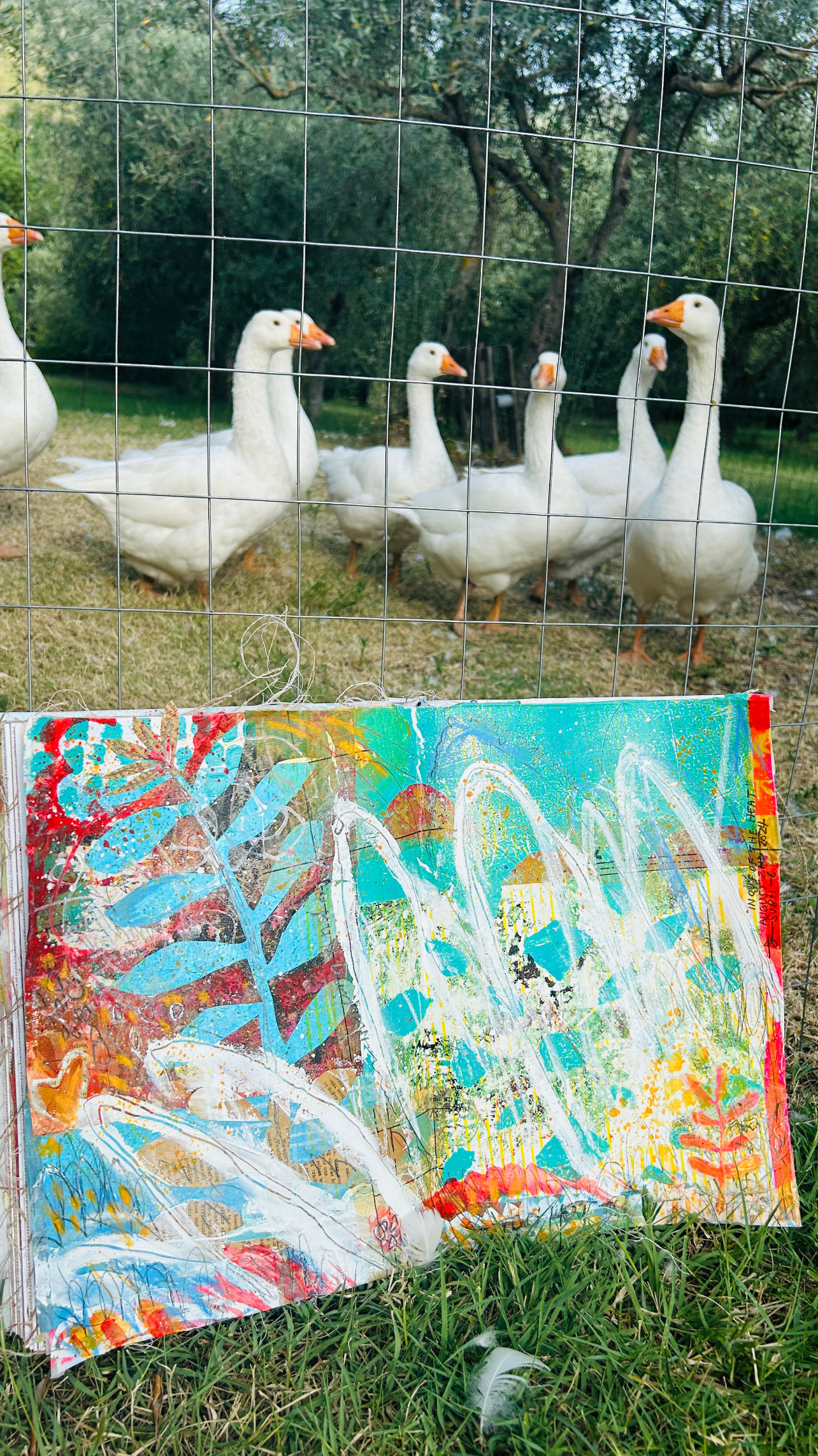 An open, illustrated book lie on a ledge. Surrounded by plants still life characterized by softer and muted colours. Illus...